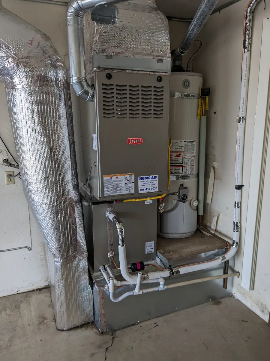 A picture of an air handler and the outside unit.