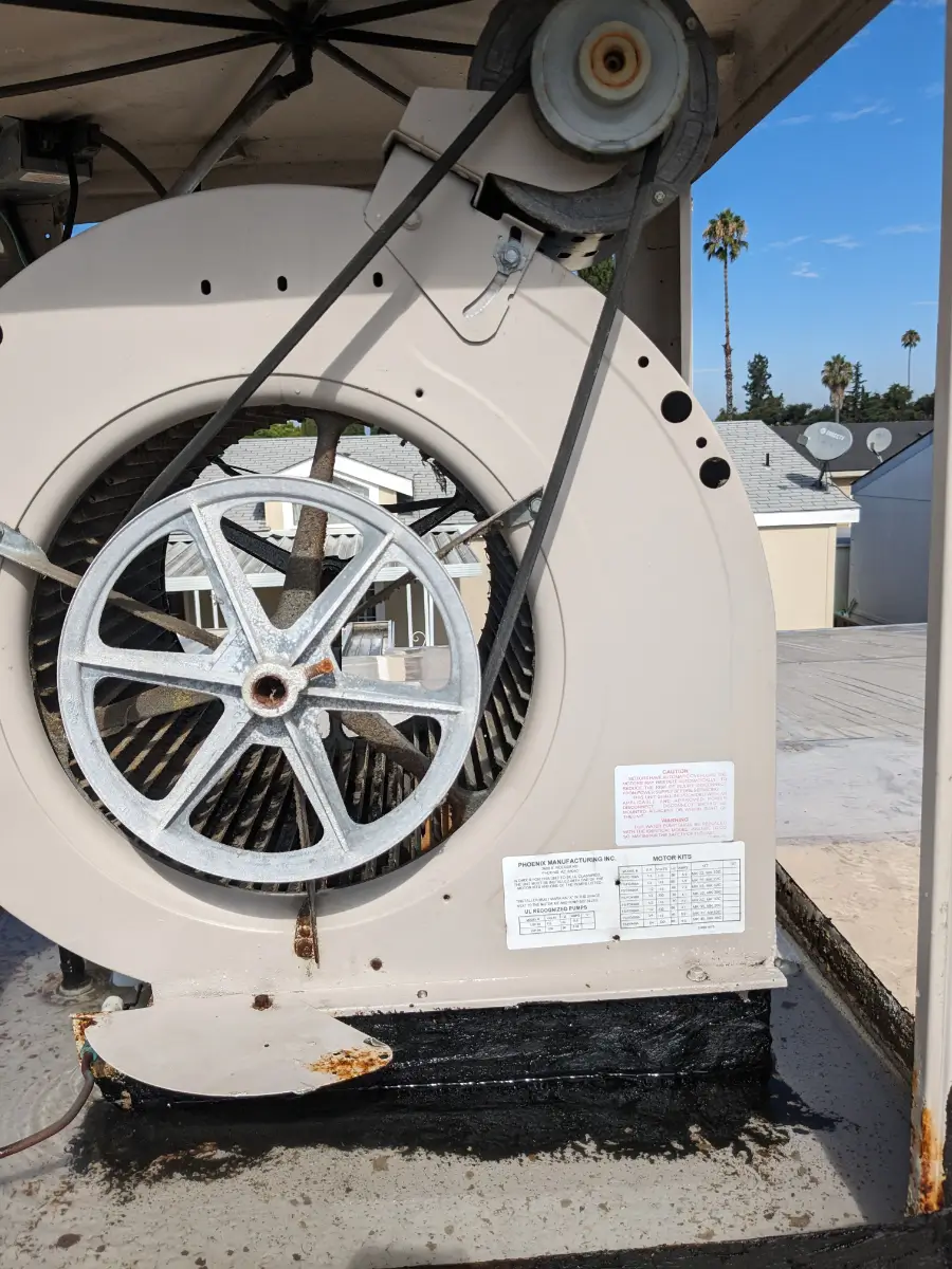 A close up of the front wheel on an industrial fan